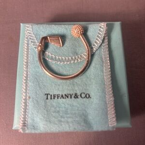 Tiffany & Co. Silver golf key ring. With pouch and box.